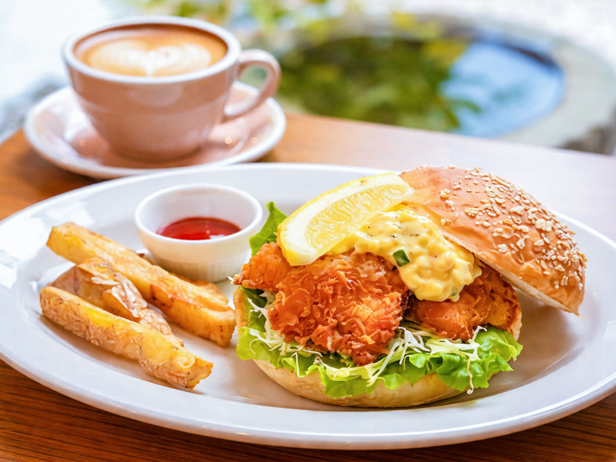 A gourmet regional burger with a delicately breaded sea bream fillet